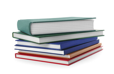 Many different books stacked on white background