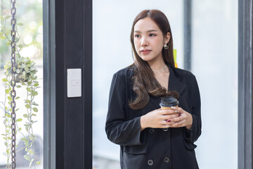 Portrait of Happy Beautiful Business Asian Woman in Office