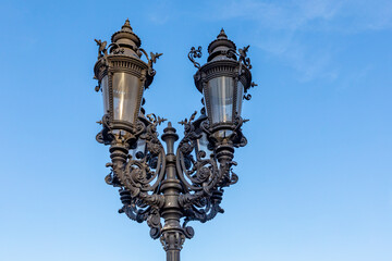 Fototapeta na wymiar historic lantern, nowaday<s electrified, at old opera house