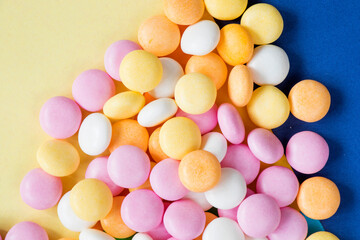 Candy on the colorful background, high angle view