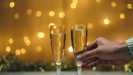 Hand Takes Glass Of Champagne