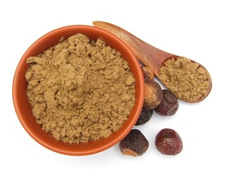 Sapindus mukorossi or Indian soapberry powder in a bowl 