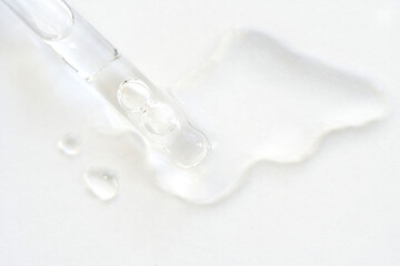 Serum gel texture swatch. Transparent drop with bubbles. Face skincare product. Liquid oil essence....