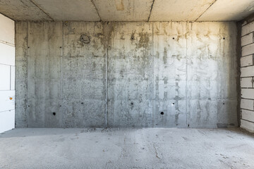 Empty concrete commercial space without finishing with partitions