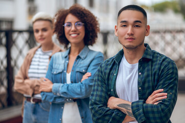 Guy in the company of ladies on the veranda