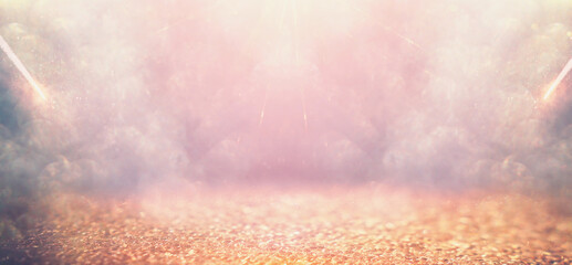 background of gold abstract glitter lights. de focused