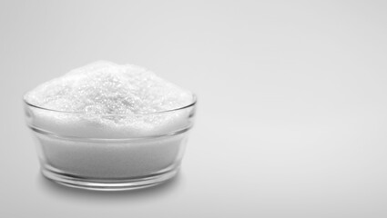 Abstract white powder on light background
