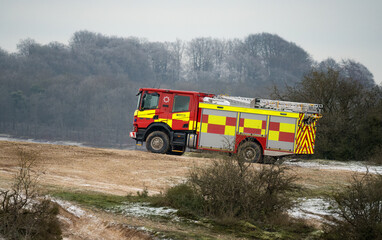WX22 AHY Scania P370 XT Angloco Fire Engine from Trowbridge, Dorset and Wiltshire Fire and Rescue undergoing off-road driver training, Tidworth Wiltshire UK