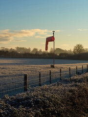 Bedfordshire, UK- December 8, 2022. Winter arrives in the UK with unexpected force. A small airfield locked deep in frost during the recent cold snap.