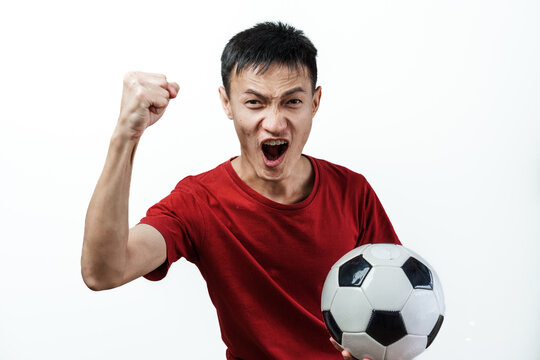 Young asian man soccer sport fans feeling happy after the cheering team wins.