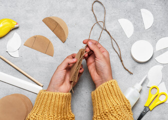 Step 6. Add Twine and Seal Inner Edge. Making of festive Christmas tree ornaments from coffee...