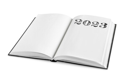 Fototapeta premium New year 2023 concept on the notepad.