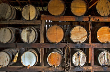 Sugarcane liquor, or cachaca in portuguese, resting in the barrel in the still for aging on...