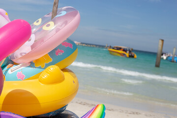 Inflatable rings on the beach. Summer concept
