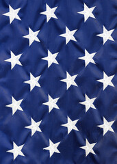 White stars on blue fabric of United States American flag