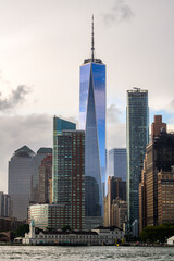 Fototapeta premium The financial district in the lower Manhattan in New York City with stormy clouds in background.