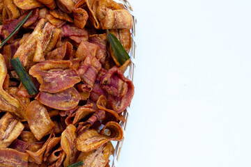 Banana slice chips on white background.