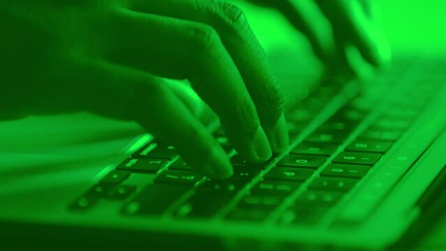 Green Keyboard with hands typing