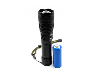 Rechargeable battery for flashlight. Black metallic Led Flashlight isolated on white background. Core Torch Zoom
