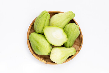 Fresh chayote fruit on white background.