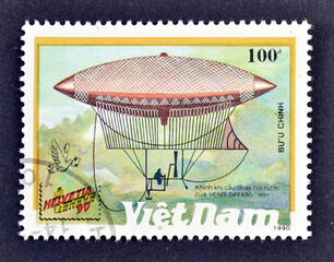Cancelled postage stamp printed by Vietnam, that shows Henry Giffara's Steam-powered Dirigible...