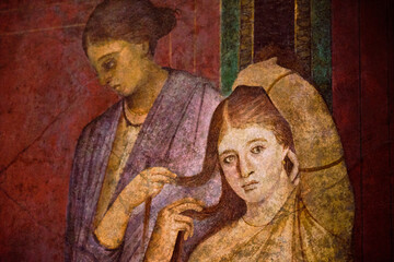 detail of the ancient painting in the Villa of the Mysteries in Pompeii. Pompeii was destroyed by the volcanic eruption in 79 BC - 553810771