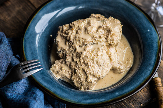 Traditional georgian dish Salmon in bazhe