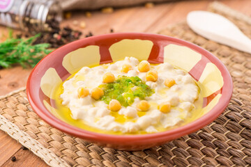 rosary food hummus or mezzeh with chickpea served in dish isolated on table side view of arabic food