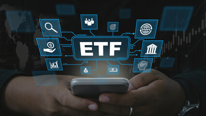 ETF,Exchange traded fund.Businessmen using a tablet with icons of ETF.Business finance concept.Stock market index fund.