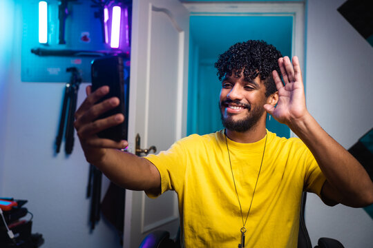 Hispanic influencer greeting vlog audience