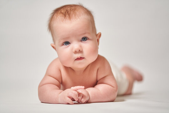 portrait of an infant on a white background