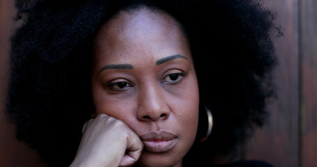 Preoccupied African woman, anxious suffering person2