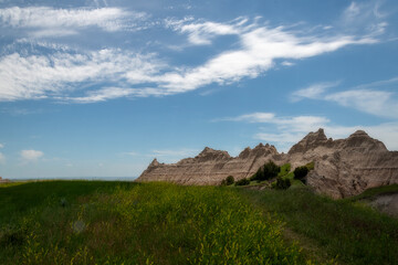 Fototapeta premium The rugged mountains of the Badlands. These geologic deposits contain one of the world’s richest fossil beds. Ancient mammals such as the rhino, horse, and saber-toothed cat once roamed here