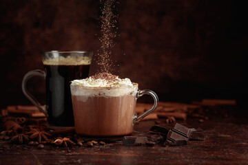 Hot chocolate with whipped cream and black coffee.