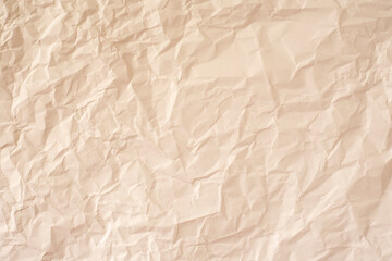 Crumpled warm paper as a background.