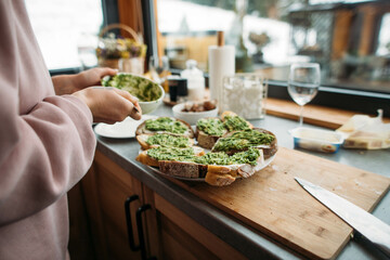 making avocado toast for breakfast