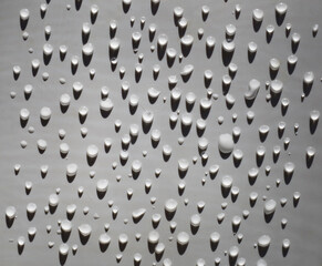 Drops on the white surface.Drops on the white surface.