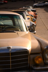 Parked cars, collector cars in a classic car race in Lu