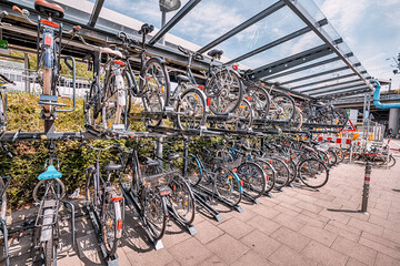Two-storey intercept parking for bicycles near the city transport hub. Safe Storage and bicycle infrastructure in a modern city