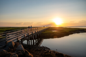 Fototapeta na wymiar Sunset on a bridge in Cape Cod