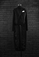 black tailcoat on a black background