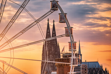Ferris wheel in Cologne, Germany with a view of the main architectural sight of the city - Koln...
