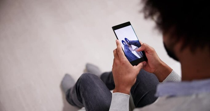 Man Trying Virtual Sneakers In Shop