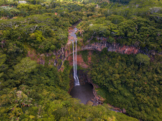 Chamarel Waterfall in Mauritius with riviere du Cup in Riviere noire district. Colorful panoramic...