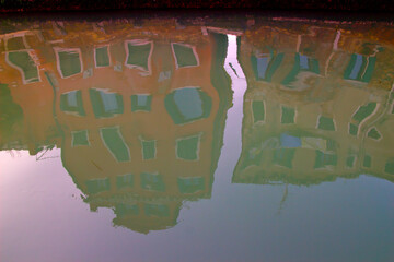 House reflection in the canal water in Venice italy