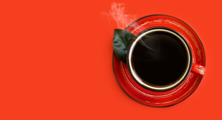Cup with coffee on a colored background