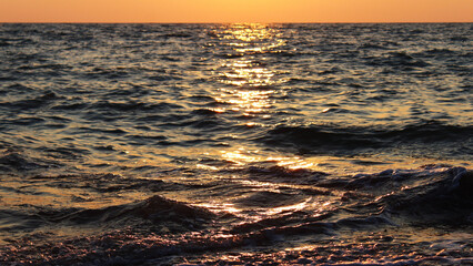 restless sea in the light of the evening sun
