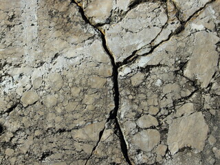 rock cut rock texture with cracks and chips
