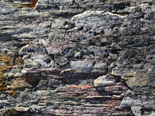 rock cut rock texture with inclusions and chips