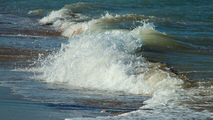 sea surf side view of the wave spray foam